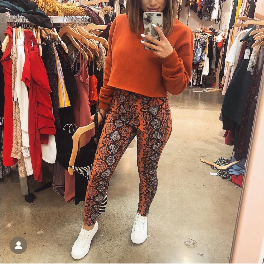 Fashion Nova orange snake print pants